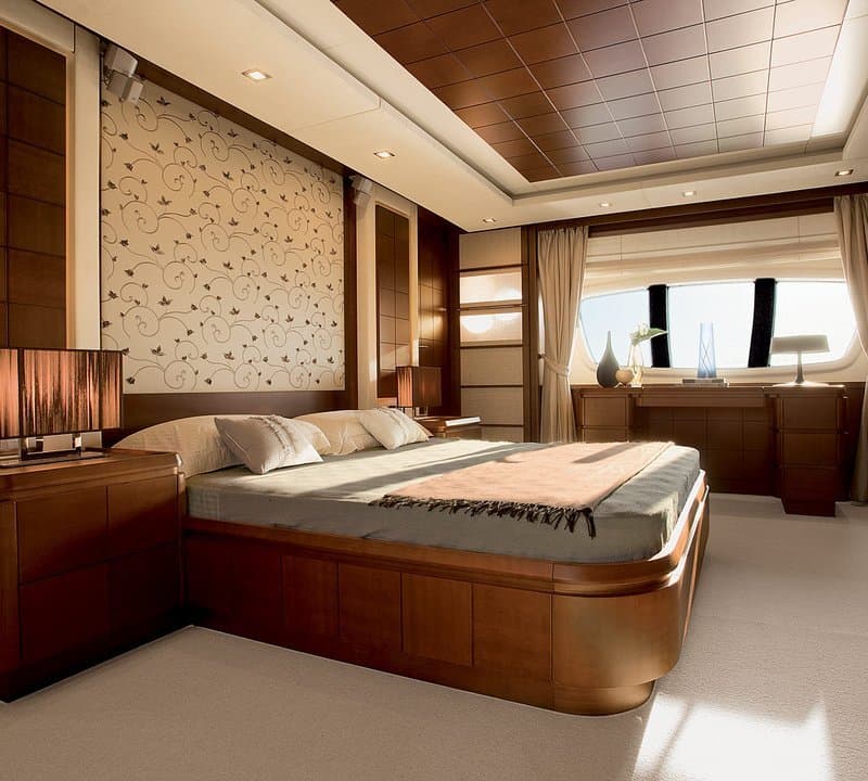 Andreika yacht master stateroom — one of four cabins on the 95ft Azimut in Cabo